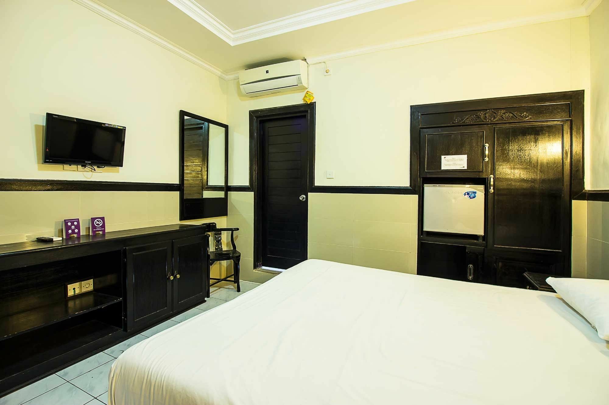 Hotel Sanjaya Managed By Tinggal Кута Экстерьер фото